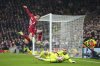 FILE - Lille's goalkeeper Lucas Chevalier saves on an attempt to score by Liverpool's Conor Bradley during the Champions League, opening phase soccer match at Anfield Stadium, in Liverpool, England, Jan.21, 2025. (AP Photo/Jon Super, File)
