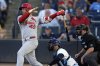 St. Louis Cardinals' Willson Contreras (40) follows through on a single off Tampa Bay Rays pitcher Joe Boyle during the first inning of a baseball game Thursday, Aug. 21, 2025, in Tampa, Fla. (AP Photo/Chris O'Meara)