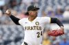 Pittsburgh Pirates pitcher Johan Oviedo delivers during the first inning of a baseball game against the Toronto Blue Jays Wednesday, Aug. 20, 2025, in Pittsburgh. (AP Photo/Matt Freed)