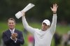 Northern Ireland's Rory McIlroy celebrates after his victory over Sweden's Joakim Lagergren following a playoff for 1st place on day four of the 2025 Amgen Irish Open at The K Club in Straffan, Ireland, Sunday, Sept. 7, 2025. (Brian Lawless/PA via AP)