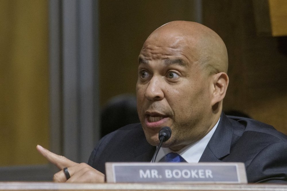FILE - Sen. Cory Booker, D-N.J., has an exchange with Subcommittee Chairman Sen. Ted Cruz, R-Texas, during a Senate Committee on the Judiciary joint subcommittee hearing to examine District Judges v. Trump, on Capitol Hill, Tuesday, June 3, 2025, in Washington. (AP Photo/Rod Lamkey, Jr., File)