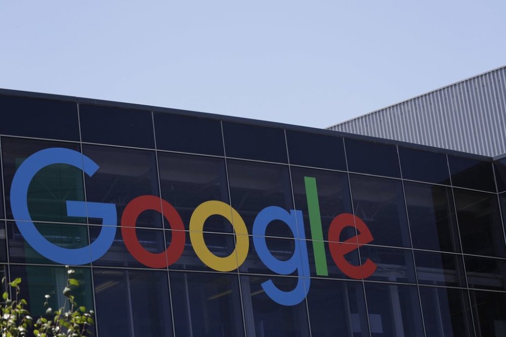 FILE - The Google logo sits on the company's headquarters in Mountain View, Calif., July 19, 2016. (AP Photo/Marcio Jose Sanchez, File)
