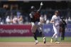 Baltimore Orioles' Alex Jackson, right, celebrates after hitting a home run during the third inning of a baseball game against the San Diego Padres Wednesday, Sept. 3, 2025, in San Diego. (AP Photo/Gregory Bull)