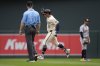 Minnesota Twins' Brooks Lee (2) runs the bases after hitting a grand slam during the third inning of a baseball game against the Detroit Tigers, Sunday, Aug. 17, 2025, in Minneapolis. (AP Photo/Abbie Parr)