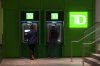 TD Bank Group reported a third-quarter profit of $3.34 billion, compared with a loss of $181 million in the same quarter last year. People use a TD Bank ATM in downtown Ottawa on Thursday, July 3, 2025. THE CANADIAN PRESS/Sean Kilpatrick