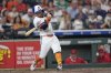 Houston Astros' Jose Altuve hits a RBI double against the Los Angeles Angels during the third inning of a baseball game Monday, Sept. 1, 2025, in Houston. (AP Photo/David J. Phillip)