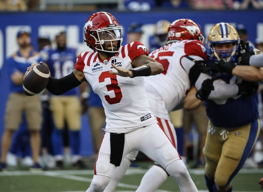 Calgary Stampeders quarterback Vernon Adams Jr. (3) throws during first-half CFL action against the Blue Bombers in Winnipeg on Friday, July 18, 2025. THE CANADIAN PRESS/John Woods