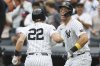 New York Yankees' Aaron Judge, right, celebrates with Ben Rice (22) after Rice hit a three-run home run during the first inning of a baseball game against the Toronto Blue Jays, Sunday, Sept. 7, 2025, in New York. (AP Photo/Heather Khalifa)