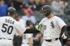 CORRECTS INNING - Chicago White Sox's Miguel Vargas (20), right, and Lenyn Sosa (50) celebrate Vargas' three-run home run during the seventh inning of a baseball game against the Philadelphia Phillies, Wednesday, July 30, 2025, in Chicago. (AP Photo/Erin Hooley)