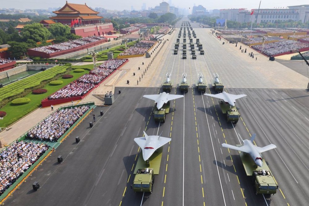 In this photo released by Xinhua News Agency, drones and other armament formations pass during the military parade to commemorate the 80th anniversary of the end of World War II held in front of Tiananmen Gate in Beijing, Wednesday, Sept. 3, 2025. (Liu Xu/Xinhua via AP)