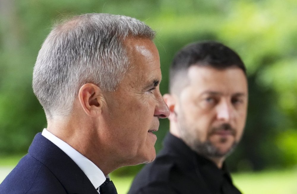 Prime Minister Mark Carney and Ukrainian President Volodymyr Zelenskyy take part in a joint press conference at Mariinskyi Palace in Kyiv, Ukraine on Sunday, Aug. 24, 2025. THE CANADIAN PRESS/Sean Kilpatrick