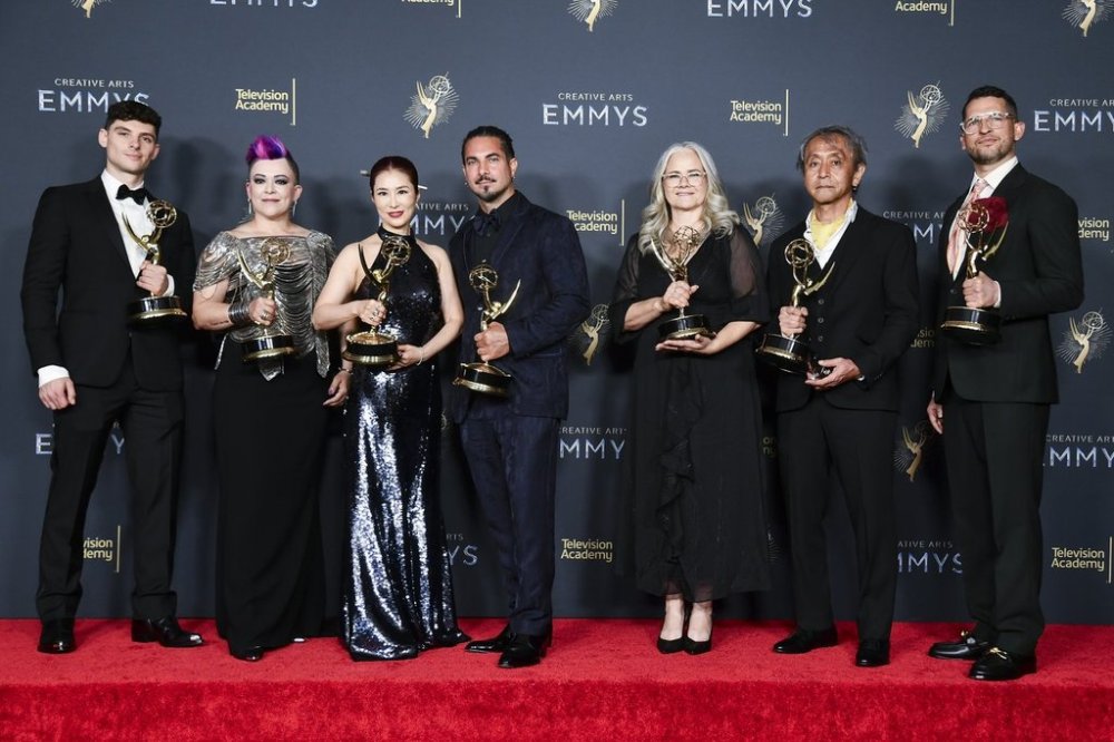 CORRECTS YEAR - Michael Fontaine, from left, Crystal Jurado, Diana Choi, Mike Marino, Claire Flewin, Yoichi Art Sakamoto, and Bobby Diehl pose in the press room with the award for outstanding prosthetic makeup for