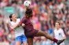 Montreal Roses FC Defender Lucy Cappadona (left) and AFC Toronto forward Esther Okoronkwo (23) jump for the ball during second half Northern Super League soccer action in Toronto on Saturday, April 19, 2025. THE CANADIAN PRESS/Arlyn McAdorey