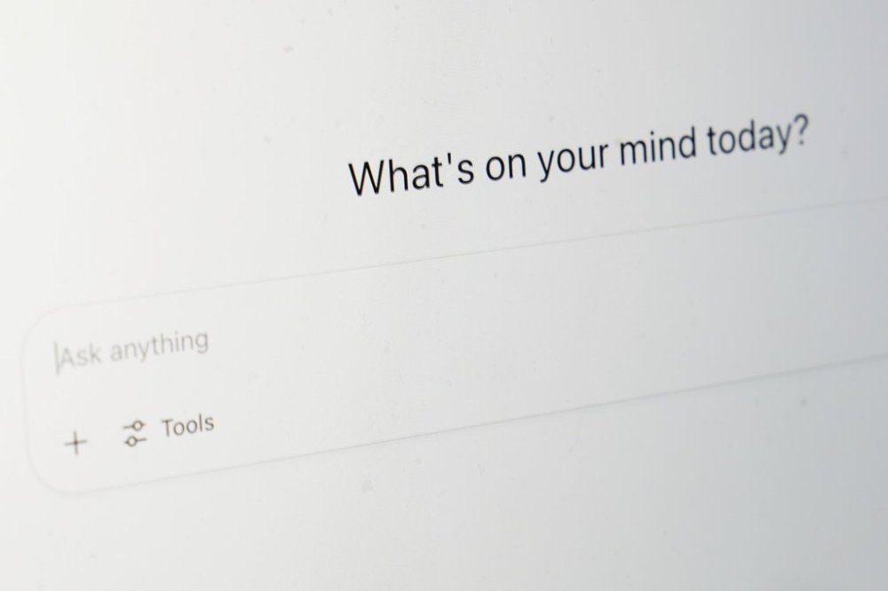 More workers are engaging with AI tools to help them complete work tasks and increase their productivity. Chat GPT's landing page is seen on a computer screen, Monday, Aug. 4, 2025, in Chicago. (AP Photo/Kiichiro Sato)