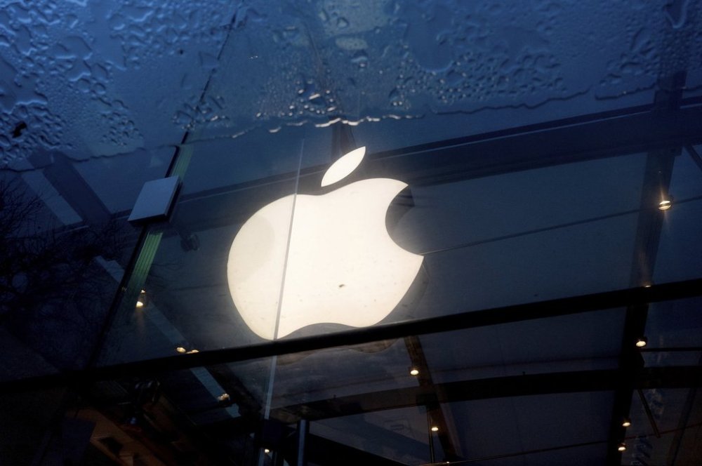 An Apple logo hangs at a Palo Alto, Calif., Apple store on Friday, Feb. 2, 2024. (AP Photo/Noah Berger)