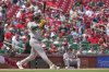 Athletics' JJ Bleday follows through on a two-run home run during the fourth inning of a baseball game against the St. Louis Cardinals Monday, Sept. 1, 2025, in St. Louis. (AP Photo/Jeff Roberson)