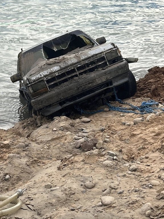 This photo provided by the Kane County Sheriff's Office shows a truck belonging to a man who has been missing since December 2023 being recovered from Lake Powell in Utah, Wednesday, Sept. 3, 2025. (Kane County Sheriff's Office via AP)