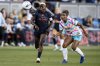 Bay FC forward Racheal Kundananji (9) and San Diego Wave FC defender Kennedy Wesley (12) chases after the ball during the first half of a NWSL soccer match in San Jose, Calif., Saturday, Aug. 16, 2025. (Stephen Lam/San Francisco Chronicle via AP)