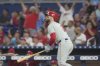 Philadelphia Phillies' Bryce Harper (3) hits a home run during the first inning of a baseball game against the Miami Marlins Saturday, Sept. 6, 2025, in Miami. (AP Photo/Marta Lavandier)