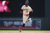 Minnesota Twins' Byron Buxton (25) runs the bases after hitting a two-run home run during the third inning of a baseball game against the San Diego Padres, Sunday, Aug. 31, 2025, in Minneapolis. (AP Photo/Abbie Parr)