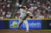 FILE - New York Yankees pitcher Fernando Cruz delivers during the seventh inning of a baseball game against the Cincinnati Reds, Tuesday, June 24, 2025, in Cincinnati. (AP Photo/Joshua A. Bickel,File)