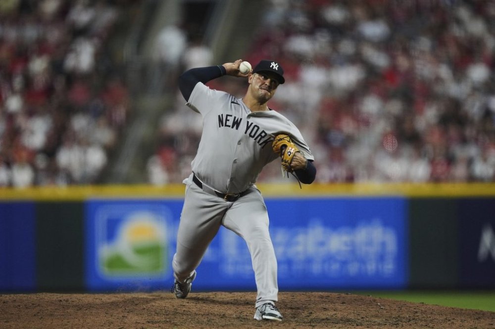 FILE - New York Yankees pitcher Fernando Cruz delivers during the seventh inning of a baseball game against the Cincinnati Reds, Tuesday, June 24, 2025, in Cincinnati. (AP Photo/Joshua A. Bickel,File)