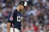 Cleveland Guardians starting pitcher Joey Cantillo reacts after a bases loaded walk during the fourth inning of a baseball game against the Atlanta Braves, Friday, Aug. 15, 2025, in Cleveland. (AP Photo/David Dermer)