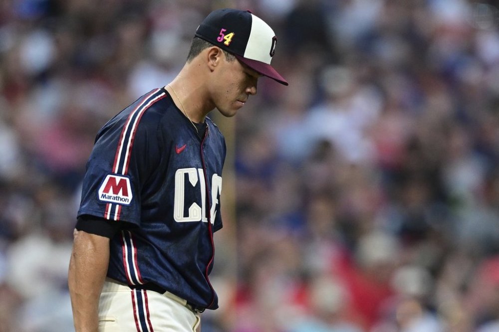 Cleveland Guardians starting pitcher Joey Cantillo reacts after a bases loaded walk during the fourth inning of a baseball game against the Atlanta Braves, Friday, Aug. 15, 2025, in Cleveland. (AP Photo/David Dermer)
