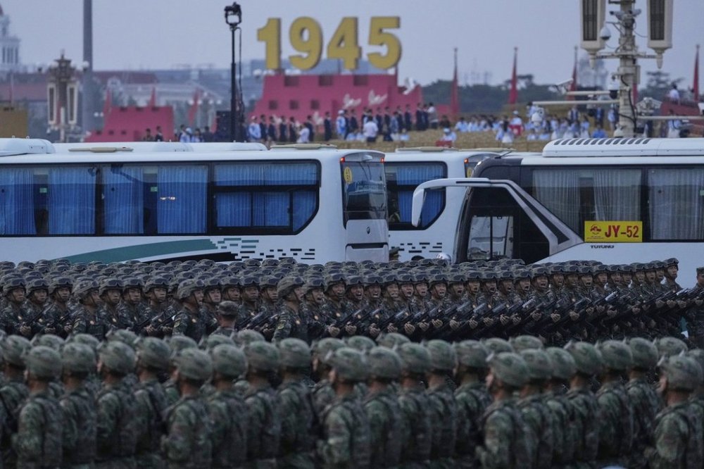 Chinese military personnel gather ahead of military parade to commemorate the 80th anniversary of Japan's World War II surrender held in front of Tiananmen Gate in Beijing, Wednesday, Sept. 3, 2025. (AP Photo/Ng Han Guan)
