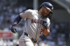 Houston Astros' Jose Altuve runs the bases after hitting a home run during the first inning of a baseball game against the New York Yankees, Sunday, Aug. 10, 2025, in New York. (AP Photo/Pamela Smith)