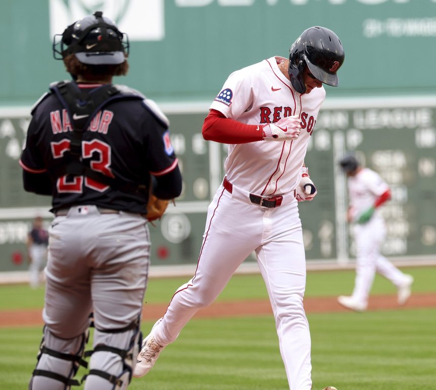Boston Red Sox's Roman Anthony, right, runs past Cleveland Guardians catcher Bo Naylor (23) to score on a balk during the first inning of a baseball game Monday, Sept. 1, 2025, in Boston. (AP Photo/Mark Stockwell)
