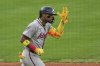Atlanta Braves' Ronald Acuna Jr. celebrates after hitting a two-run home run during the third inning of a baseball game against the Kansas City Royals, Monday, July 28, 2025, in Kansas City, Mo. (AP Photo/Charlie Riedel)