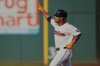 Cleveland Guardians' Jose Ramirez gestures as he runs the bases with a home run in the first inning of a baseball game against the Miami Marlins in Cleveland, Tuesday, Aug. 12, 2025. (AP Photo/Sue Ogrocki)