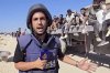 This undated recent image, taken from video broadcast by the Qatari-based television station Al Jazeera, shows the network's Arabic-language Gaza correspondent, Anas al-Sharif, reporting on camera in Gaza. Al-Sharif and four other Al Jazeera staff members were killed by an Israeli drone strike on their tent in Gaza City shortly before midnight on Sunday. (Al Jazeera via AP)