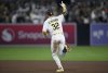 San Diego Padres' Ryan O'Hearn rounds the bases after hitting a solo home run during the seventh inning of a baseball game against the San Francisco Giants Wednesday, Aug. 20, 2025, in San Diego. (AP Photo/Orlando Ramirez)