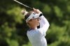 Nelly Korda hits from the third tee during the first round of the FM Championship LPGA golf tournament at TPC Boston, Thursday, Aug. 28, 2025, in Norton, Mass. (AP Photo/Michael Dwyer)