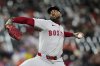 Boston Red Sox relief pitcher Aroldis Chapman delivers during the ninth inning of a baseball game against the Baltimore Orioles, Wednesday, Aug. 27, 2025, in Baltimore. (AP Photo/Stephanie Scarbrough)