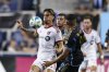 Toronto FC's Theo Corbeanu, left, plays the ball past Philadelphia Union's Kai Wagner, center front, and Tai Baribo (9) during the first half of an MLS soccer match, Saturday, Aug. 9, 2025, in Chester, Pa. (AP Photo/Derik Hamilton)
