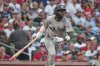 New York Yankees' Jazz Chisholm Jr. watches his two-run home run during the first inning of a baseball game against the St. Louis Cardinals Friday, Aug. 15, 2025, in St. Louis. (AP Photo/Jeff Roberson)
