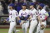From left, New York Mets' Jeff McNeil, Tyrone Taylor, Brett Baty and Starling Marte react after defeating the Philadelphia Phillies during a baseball game, Wednesday, Aug. 27, 2025, in New York. (AP Photo/Pamela Smith)