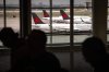 People walk near the Air Canada check-in area inside Terminal 1 of Toronto Pearson International Airport, in Mississauga, Ont., on Wednesday, August 13 2025. THE CANADIAN PRESS/Arlyn McAdorey