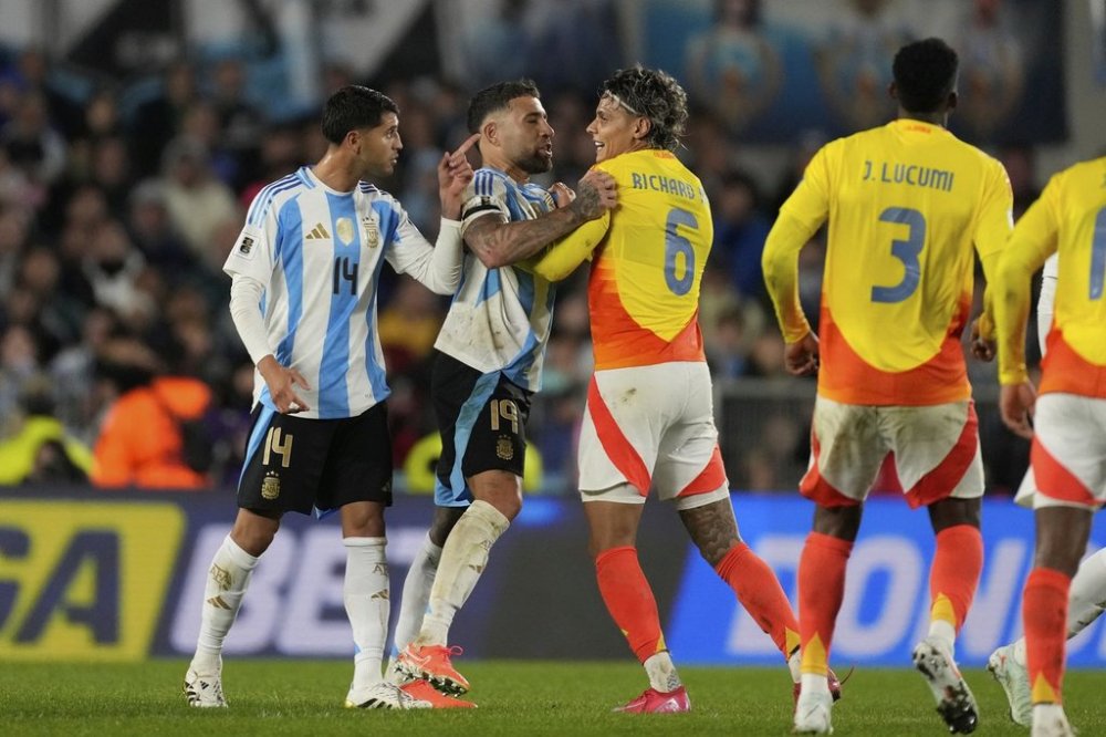FILE - Colombia's Richard Rios (6) argues Argentina's Nicolas Otamendi, second from left, during a qualifying soccer match for the FIFA World Cup 2026 at the Monumental stadium in Buenos Aires, Argentina, Tuesday, June 10, 2025. (AP Photo/Gustavo Garello, File)