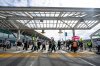 Picketers march around the departures level at the Vancouver International Airport in Richmond, B.C., on Sunday, Aug. 17, 2025. Air Canada made the call to halt a return to operation as flight attendants continue to strike. THE CANADIAN PRESS/Ethan Cairns