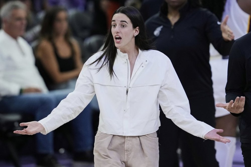 Indiana Fever's Caitlin Clark reacts at the end of the first half of a WNBA basketball game against the Golden State Valkyries, Sunday, Aug. 31, 2025, in San Francisco. (AP Photo/Godofredo A. Vásquez)