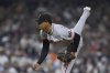 San Francisco Giants relief pitcher Randy Rodriguez works against a San Diego Padres batter during the ninth inning of a baseball game Monday, Aug. 18, 2025, in San Diego. (AP Photo/Orlando Ramirez)