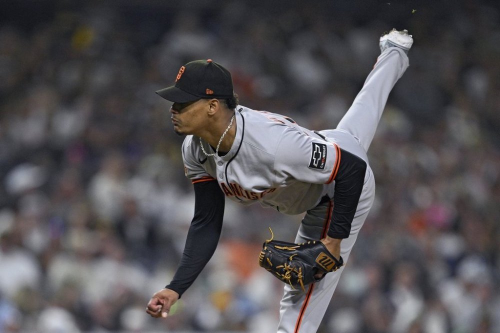 San Francisco Giants relief pitcher Randy Rodriguez works against a San Diego Padres batter during the ninth inning of a baseball game Monday, Aug. 18, 2025, in San Diego. (AP Photo/Orlando Ramirez)