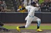 Tampa Bay Rays' Yandy Díaz (2) singles off Seattle Mariners pitcher George Kirby during the second inning of a baseball game Wednesday, Sept. 3, 2025, in Tampa, Fla. (AP Photo/Chris O'Meara)