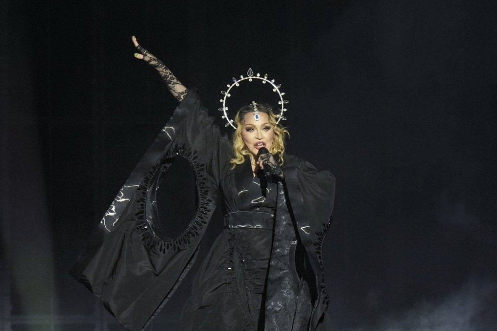 FILE - Madonna performs in the final show of her The Celebration Tour, on Copacabana Beach in Rio de Janeiro, Brazil, Saturday, May 4, 2024. (AP Photo/Silvia Izquierdo, File)