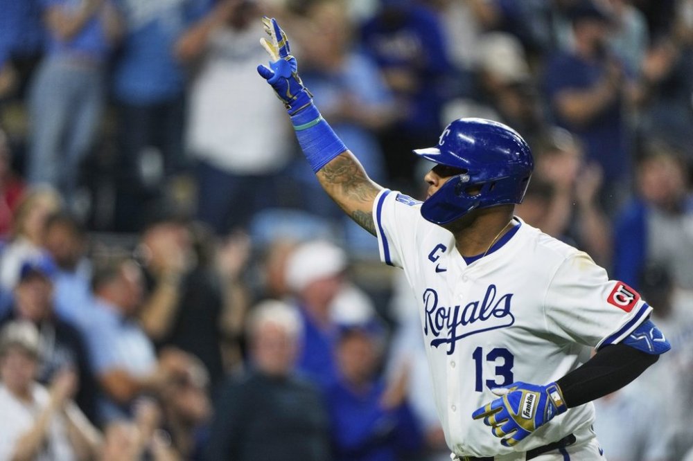 Kansas City Royals' Salvador Perez celebrates as he crosses the plate after hitting a solo home run during the seventh inning of a baseball game against the Los Angeles Angels, Thursday, Sept. 4, 2025, in Kansas City, Mo. (AP Photo/Charlie Riedel)