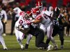 Calgary Stampeders quarterback P.J. Walker (2) gets sacked by Ottawa Redblacks defensive lineman Blessman Ta'ala (55) during second half CFL football action in Ottawa on Thursday, July 31, 2025. THE CANADIAN PRESS/Sean Kilpatrick